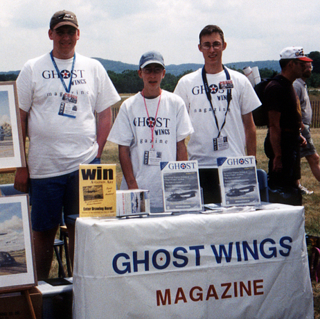 Adam Makos stands with his brother Bryan and friend Joe Gohrs as they sell their self published magazine "Ghost Wings." 
