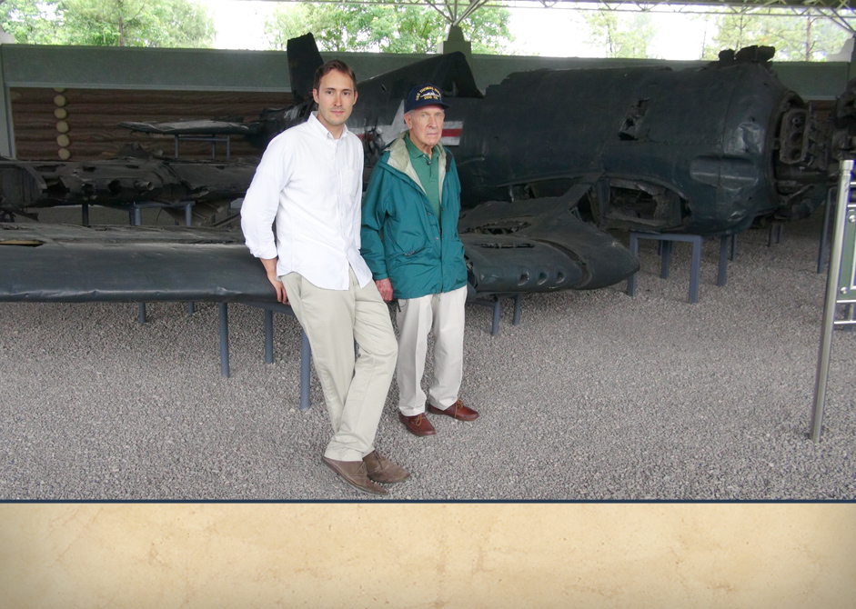 Adam Makos and Tom Hudner with an F4U Corsair. 