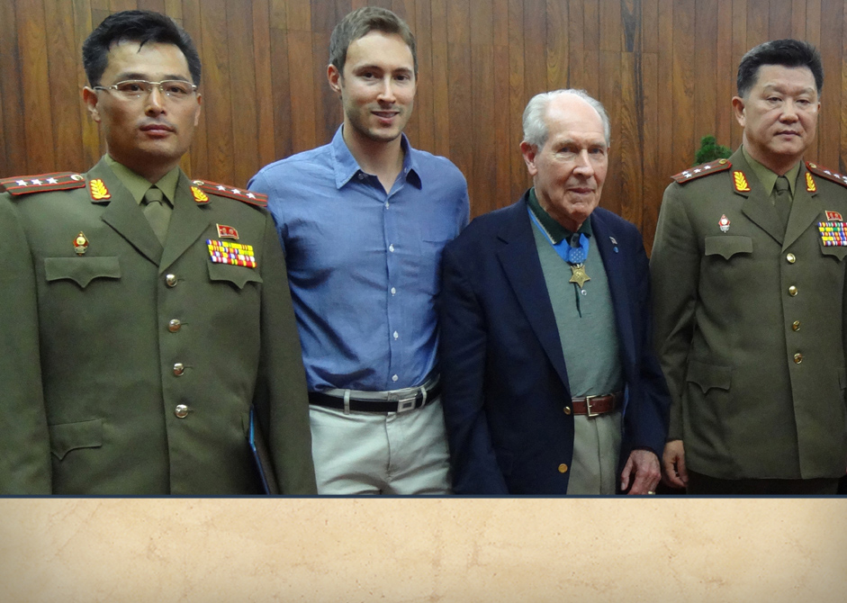 Posing with North Korean Army Officials