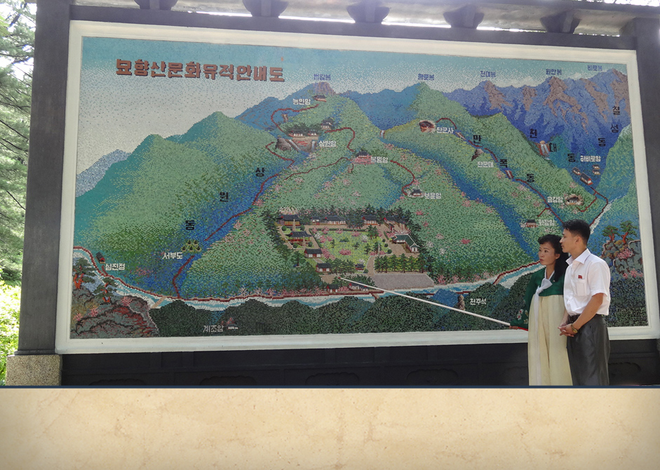 North Koreans with a map. 