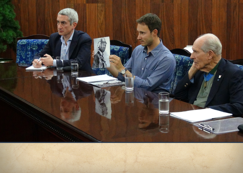 L-R: A reporter from the Associated Press, Adam, and Tom during their meeting with the North Korean Army officials.